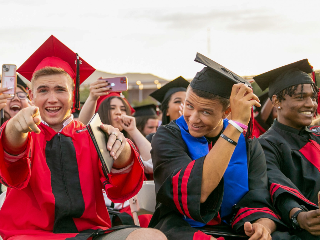 Picture of two male graduating students